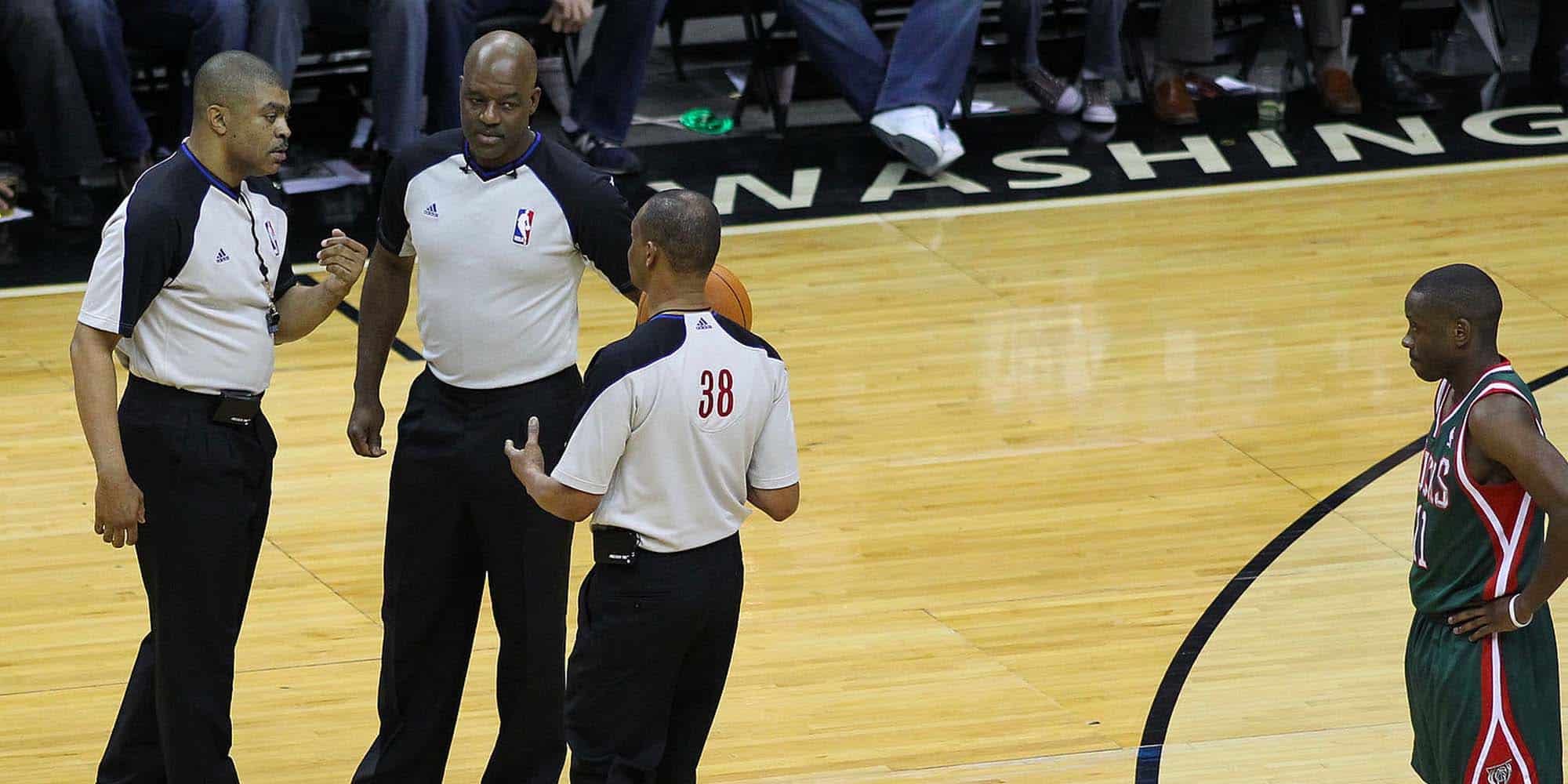 nba referees officiating a match