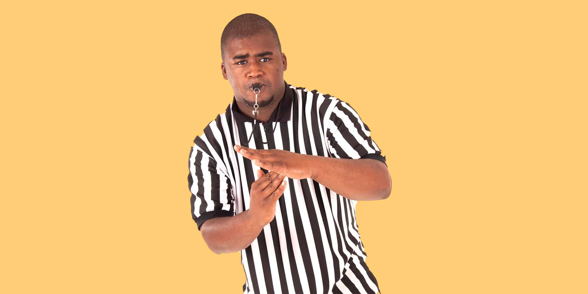 referee making technical foul hand signal